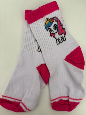 Unicornio puño fucsia